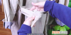 怎么系风衣后面的带子，风衣后面的腰带怎么系