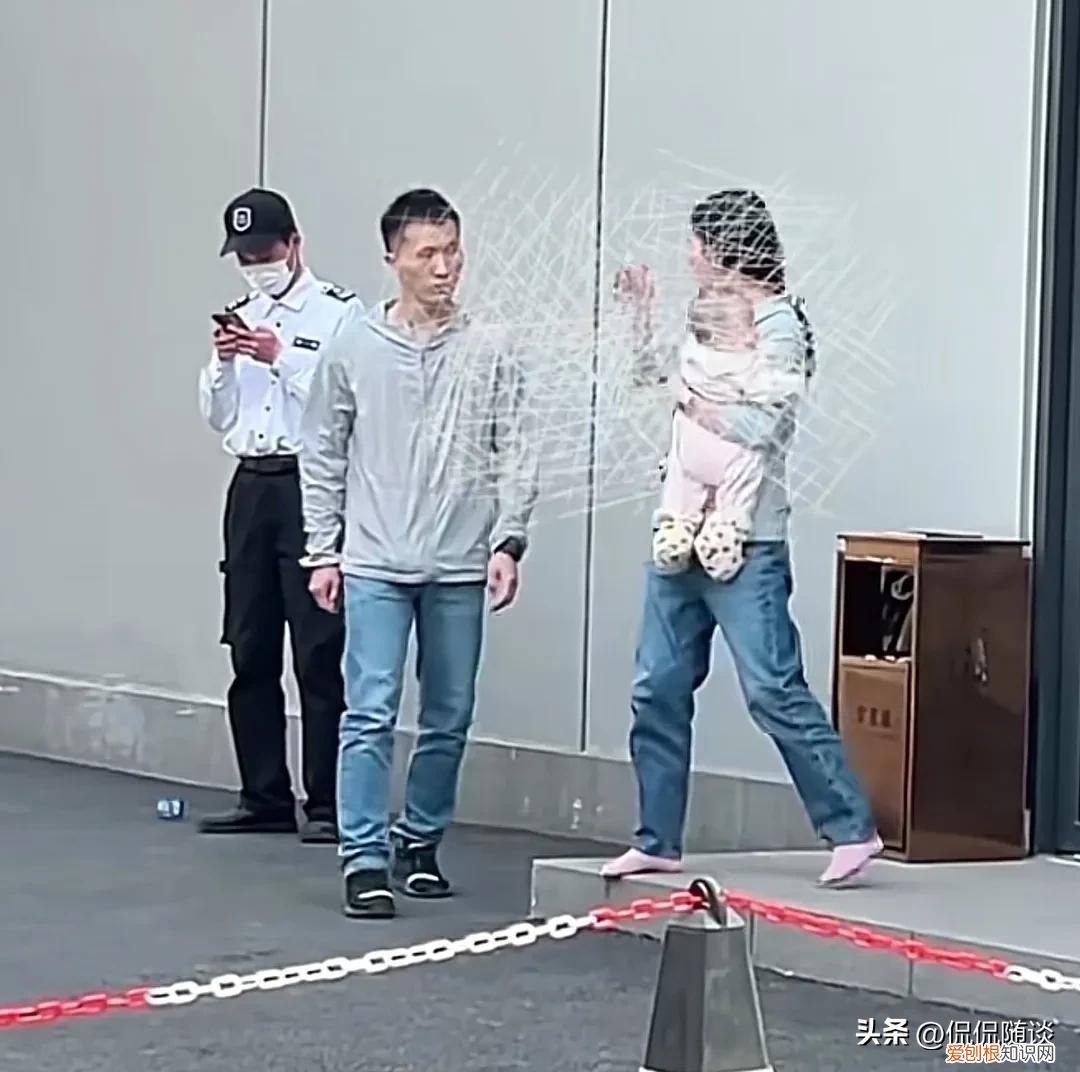 事发广州，一女子抱着娃遭男子挥拳打脸