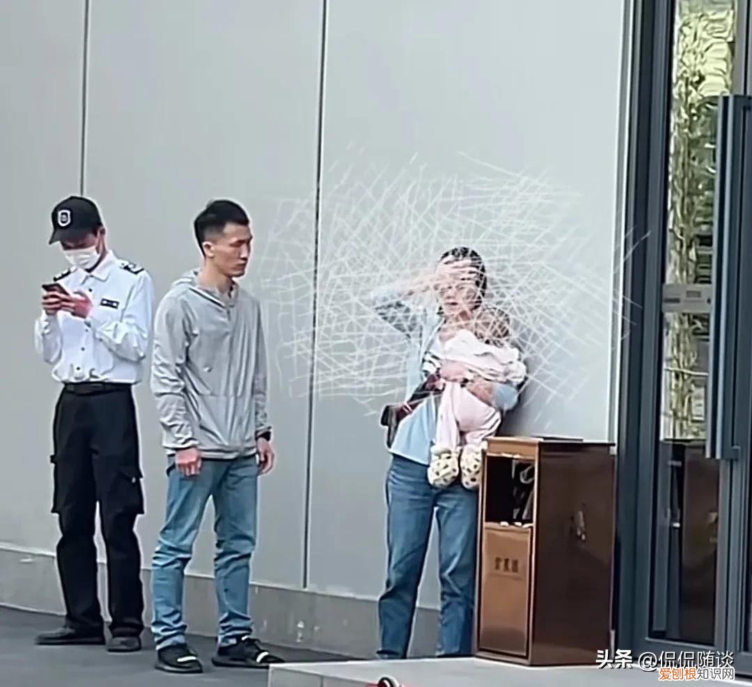 事发广州，一女子抱着娃遭男子挥拳打脸