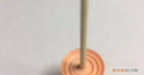 旋转的陀螺怎么做,能转的爱心陀螺用纸怎么折