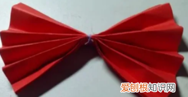 如何制作大红花剪纸，红布做的大红花怎么扎