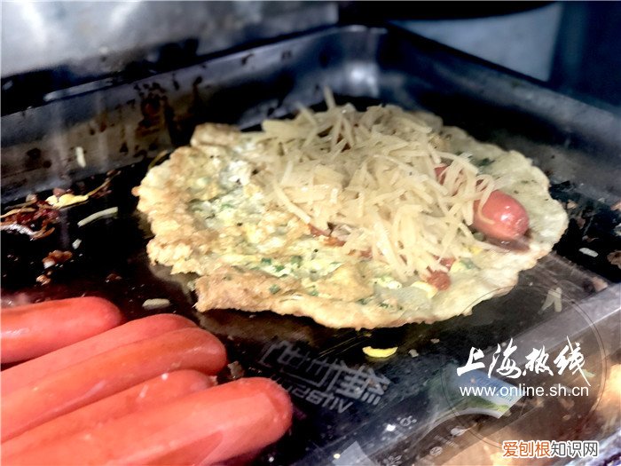 上海蔥油餅?zāi)募易钣忻?
onload=