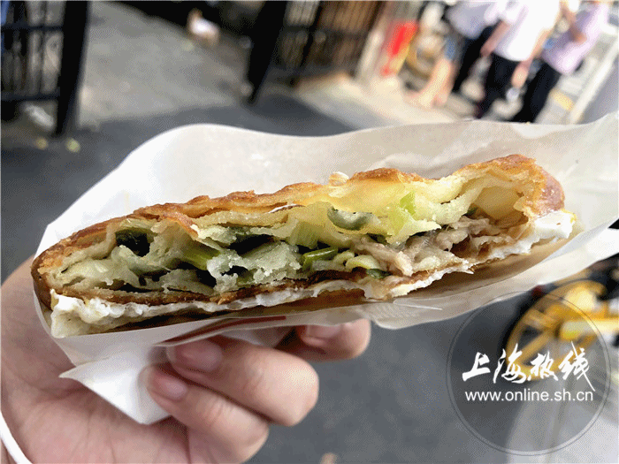 上海蔥油餅?zāi)募易钣忻?
onload=